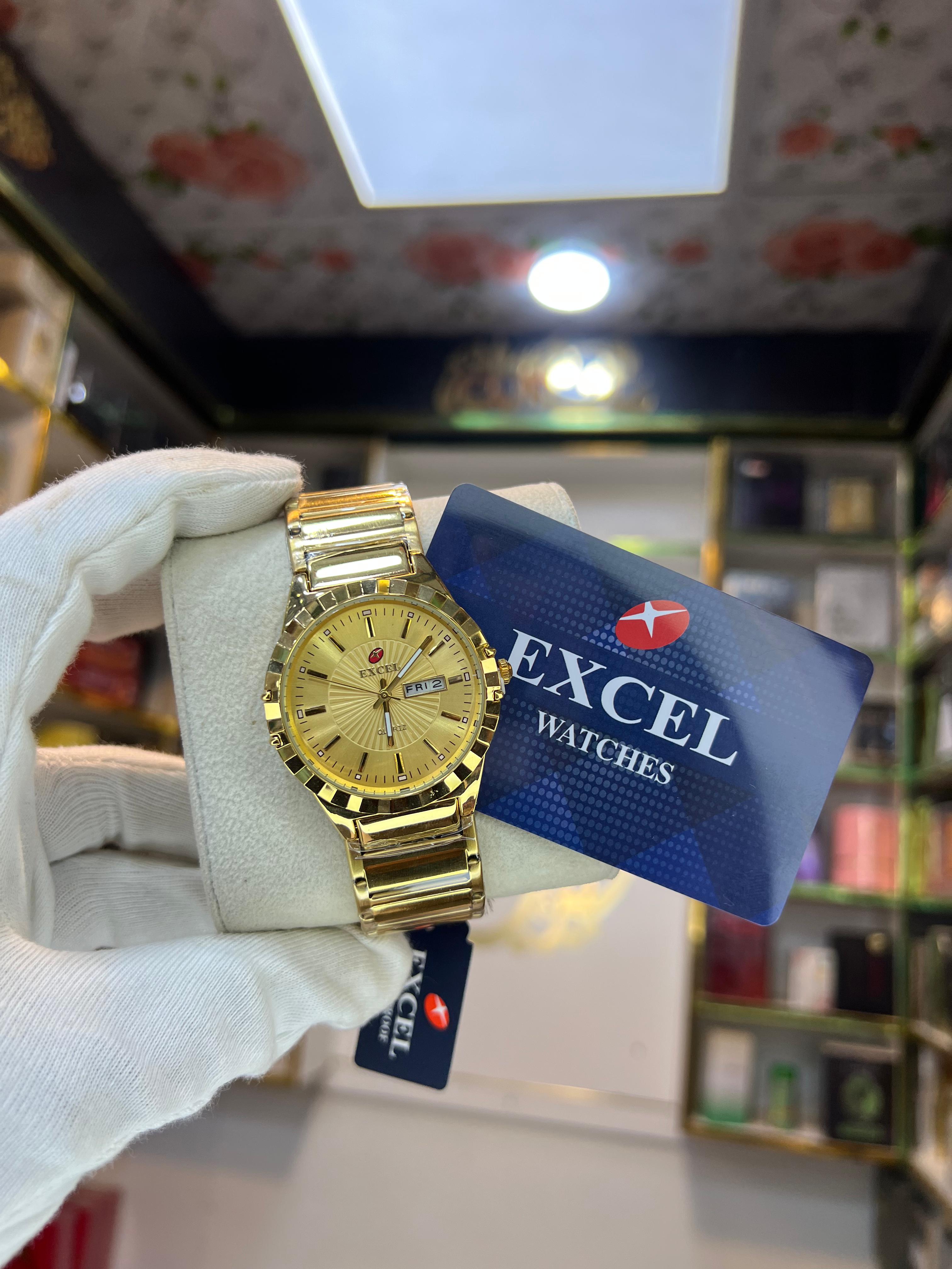 EXCEL Aurum gold day-date bracelet watch